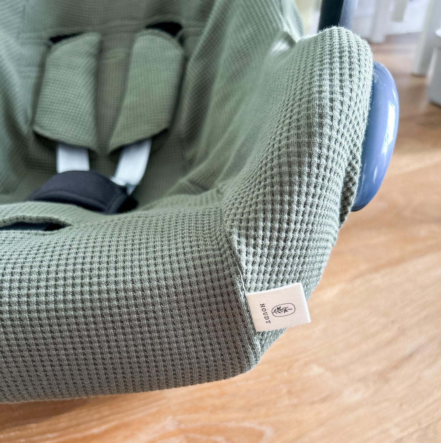 Close up van hoes voor Maxi Cosi groen wafelstof