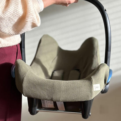 Hoes Maxi Cosi in wafelstof donkergroen